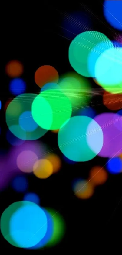 Colorful bokeh lights on a dark background wallpaper.