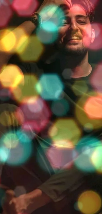 Man with colorful bokeh lights background on mobile wallpaper.