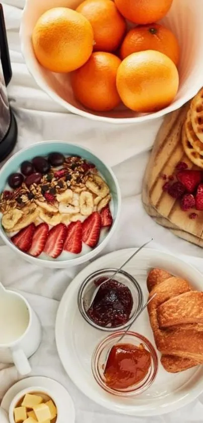 Colorful breakfast spread with fruits, waffles, and pastries.