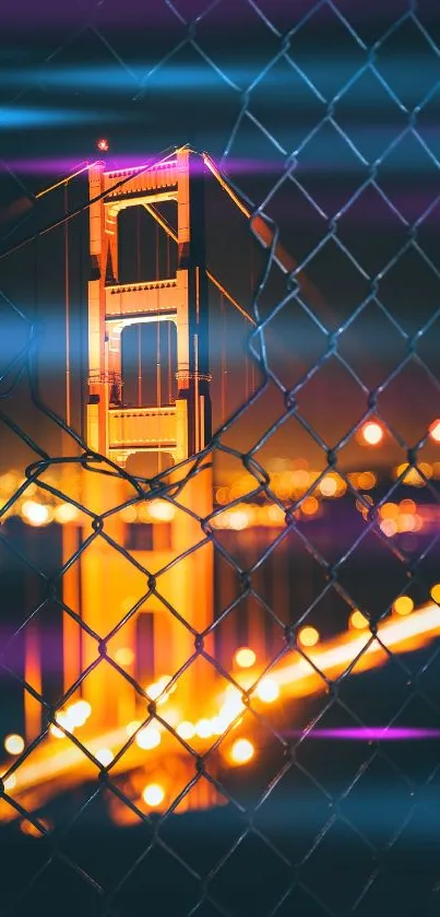 Illuminated bridge with glowing lights behind a fence at night.