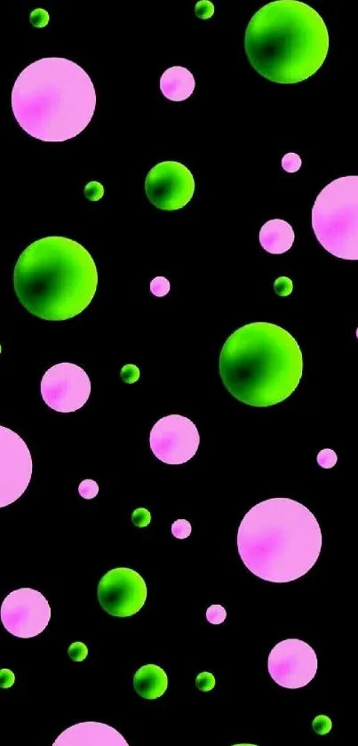 Colorful bubbles wallpaper with green and pink bubbles on black background.