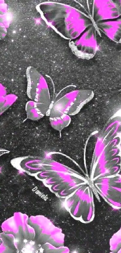 Pink butterflies and flowers on a glittery black background.