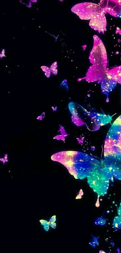 Colorful neon butterflies on a black background forming a galaxy-like pattern.