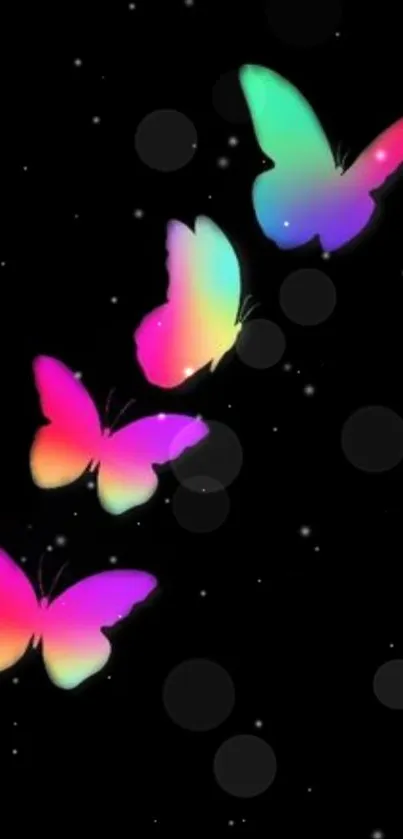 Vibrant rainbow butterflies on a starry dark background.