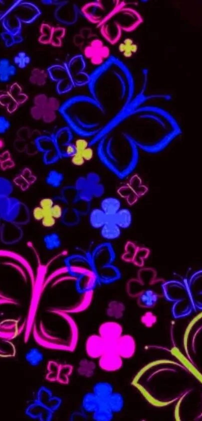 Neon butterflies on a dark background with vibrant pink and purple colors.