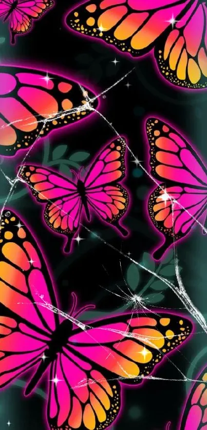 Pink and orange butterfly wallpaper on a dark background.