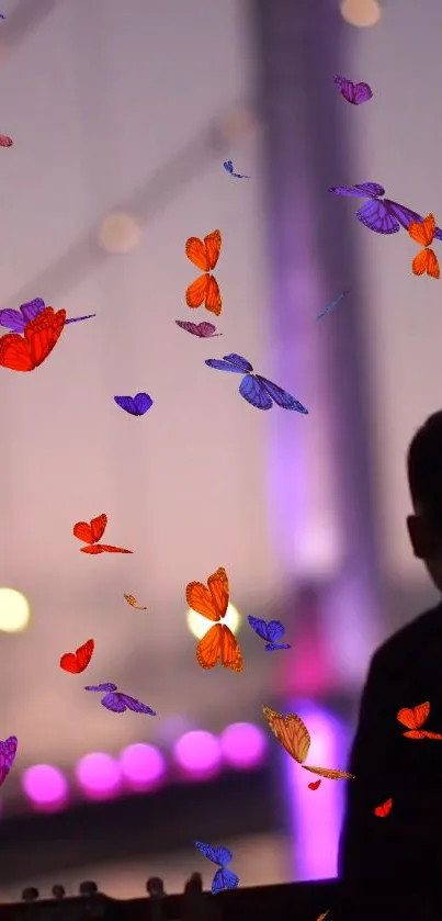 Silhouette with vibrant butterflies on a purple background wallpaper.