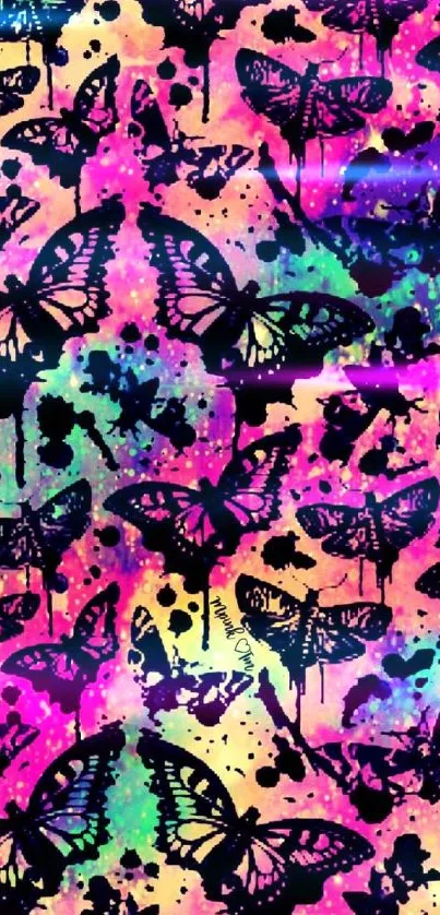 Vibrant butterfly mobile wallpaper with colorful splatters in magenta and teal hues.