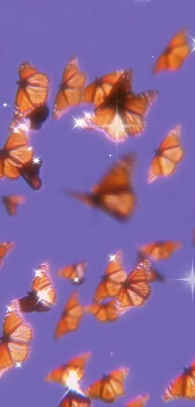 Swirling orange butterflies on lavender background wallpaper.