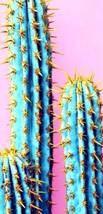 A vibrant turquoise cactus on a pink background for mobile wallpaper.