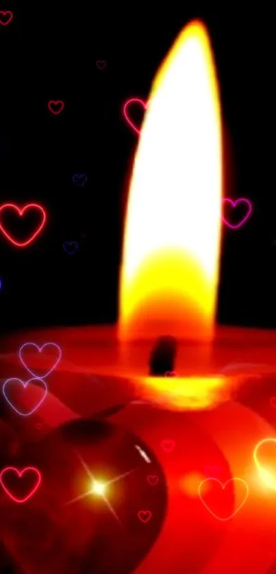 Vibrant candle flame with glowing hearts wallpaper.