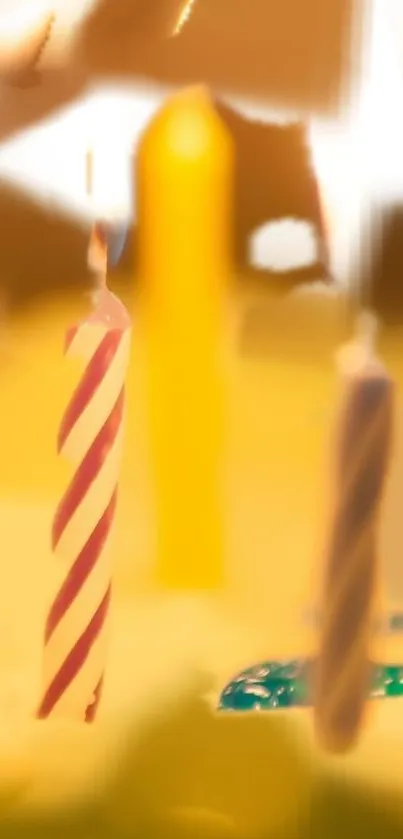 Vibrant candles with colorful backgrounds in bright yellow hues.
