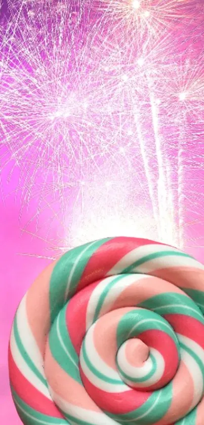 Colorful candy swirl with fireworks on pink background.