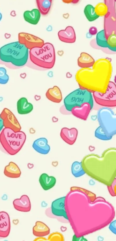 Colorful candy hearts with love messages on white background.