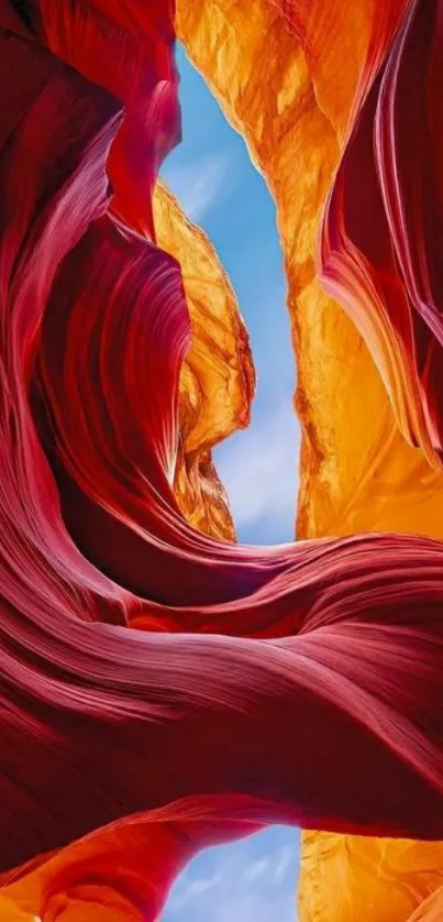 Vibrant red and orange canyon wallpaper with swirling patterns.