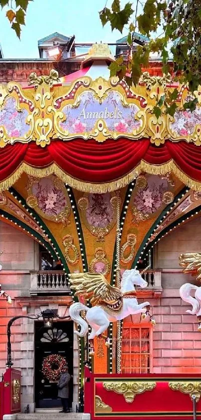 Colorful carousel facade with pegasus horses and ornamental red details.