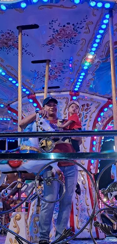 Father and child on carousel with blue lights.