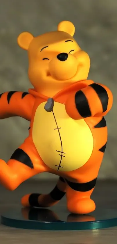 Cheerful orange cartoon bear with stripes on a gray background.