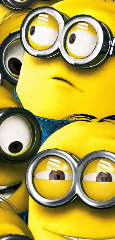 Cartoon minions in vivid yellow hues dominate the phone wallpaper.