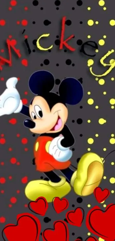 Colorful cartoon mouse wallpaper with hearts and dots on dark background.