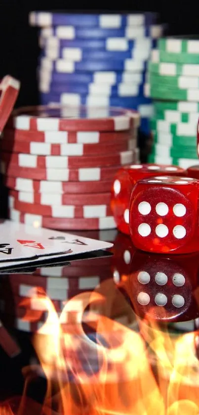 Colorful poker chips and red dice on a black background.