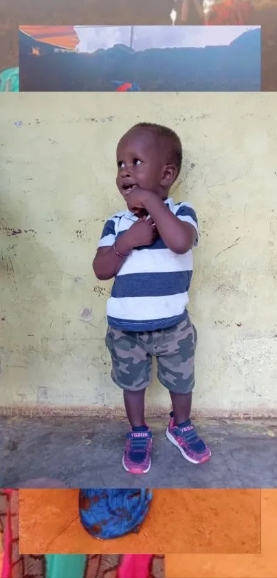 A joyful child in stripes and camo shorts against a beige background.