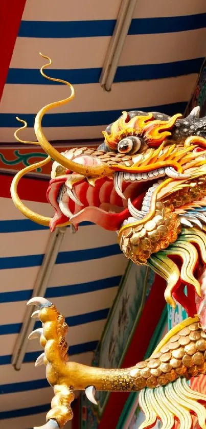 Vibrant gold dragon with colorful details on traditional roof.