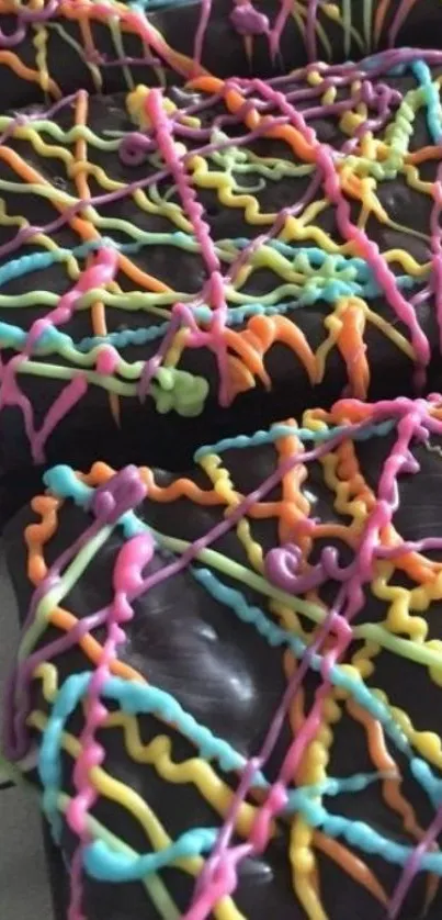 Chocolate cake squares with colorful icing patterns.