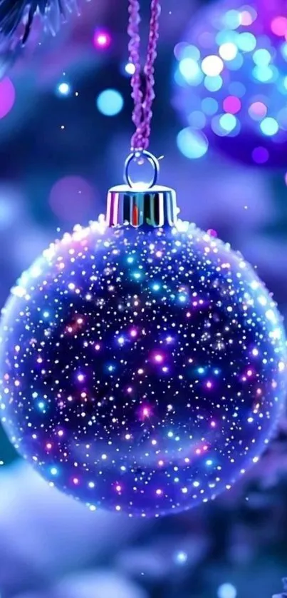 Vibrant Christmas ornament with sparkling lights on a holiday tree.