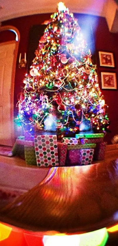 Christmas tree decorated with colorful lights and gifts under it.