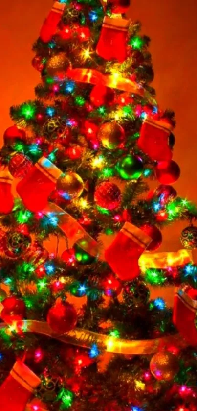 Vibrant Christmas tree with colorful lights and stockings.