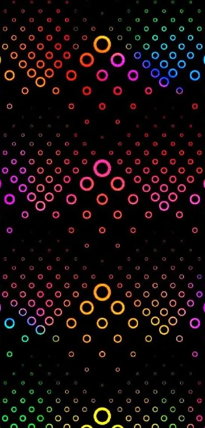 Vibrant multicolored circle pattern on black wallpaper.