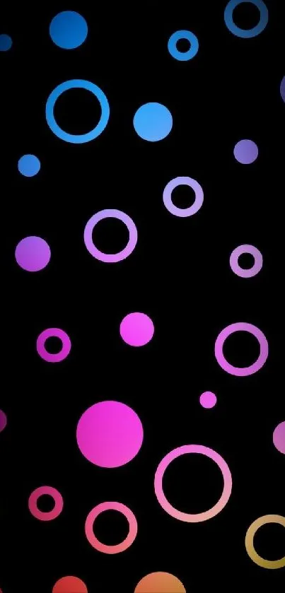 Colorful circles on black background wallpaper.