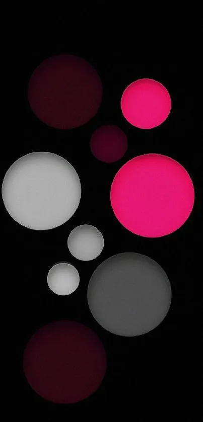 Mobile wallpaper with vibrant pink and white circles on black background.