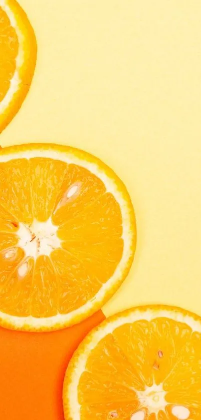 Vibrant wallpaper featuring orange slices on a yellow background.