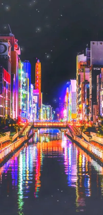 Vibrant city lights reflecting in a canal at night, perfect for mobile wallpaper.