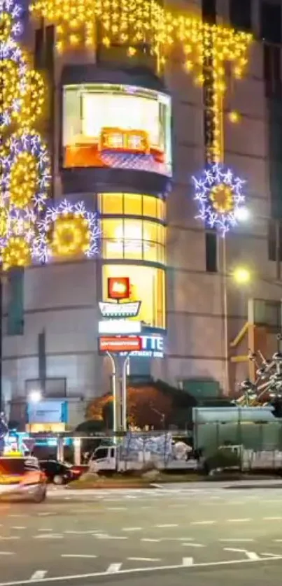 Vibrant city street with dazzling holiday lights and traffic at night.