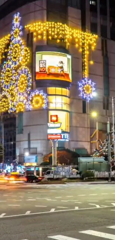Festive city lights showcase on urban building at night.