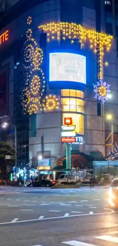 Night view of Lotte building with glowing lights and city street.