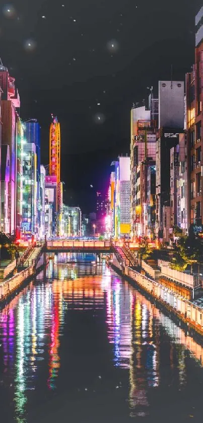 Vibrant city night scene with colorful reflections and lights.