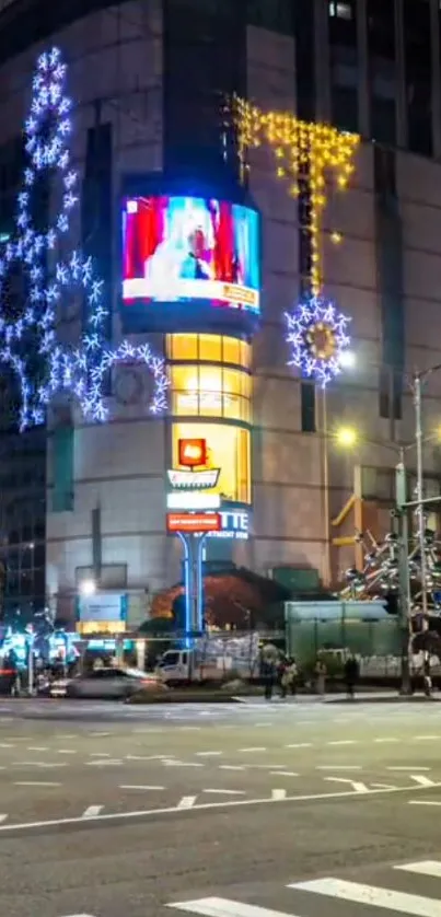 Nighttime city scene with bright lights and decorated buildings.