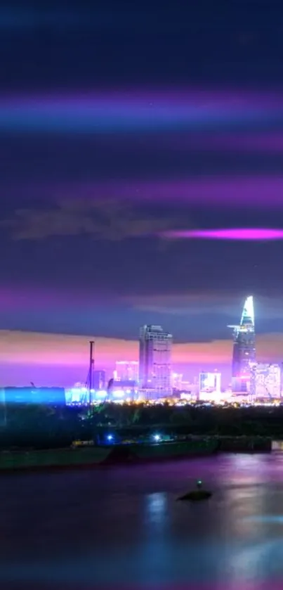 Purple and blue city nightscape glowing with urban lights.