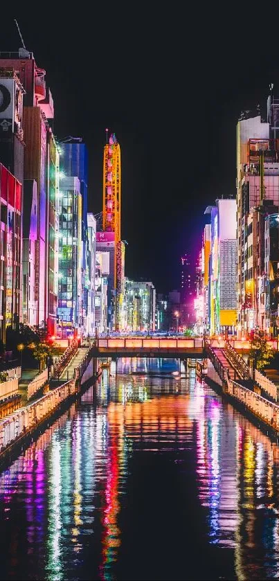 Colorful neon cityscape with river reflections at night.