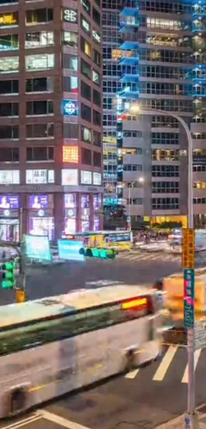 Vibrant night cityscape with tall buildings and moving traffic.