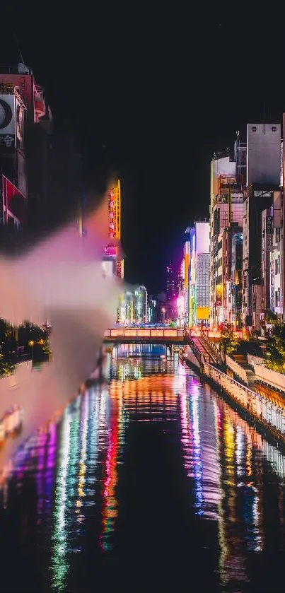 Colorful city nightscape reflecting on a calm river.