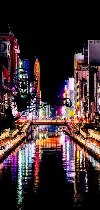 Vibrant city nightscape with colorful lights reflecting on a canal.