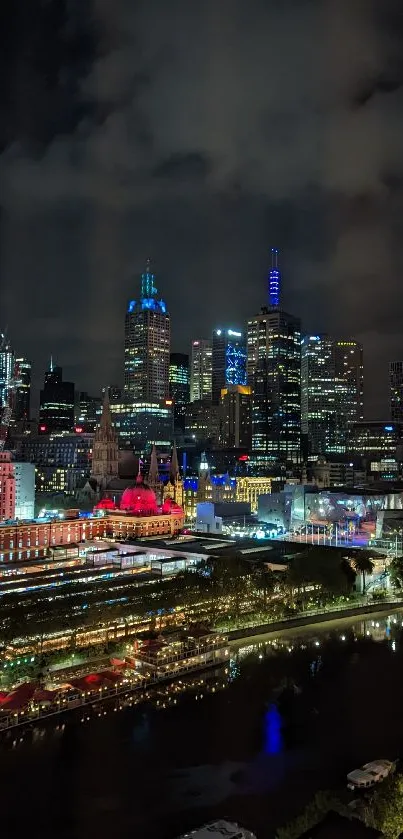 City skyline at night with vibrant lights.