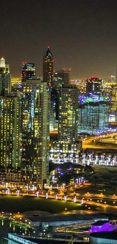 Night cityscape with illuminated skyscrapers and vibrant lights.