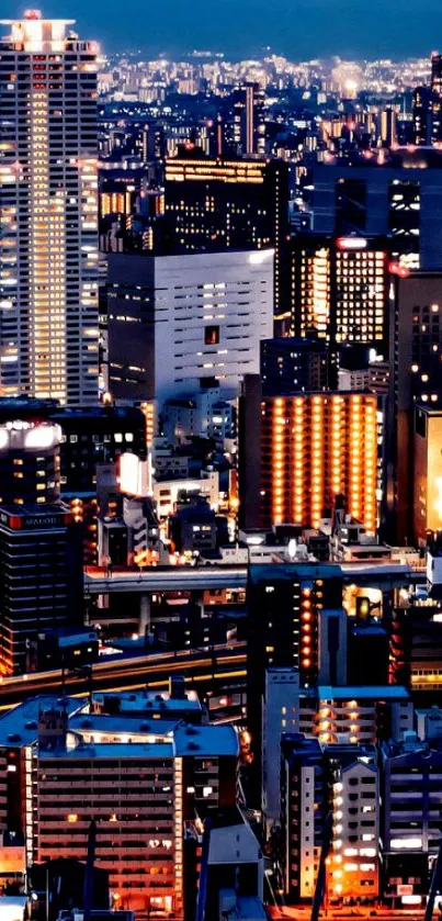 Vibrant city nightscape wallpaper with illuminated skyscrapers.