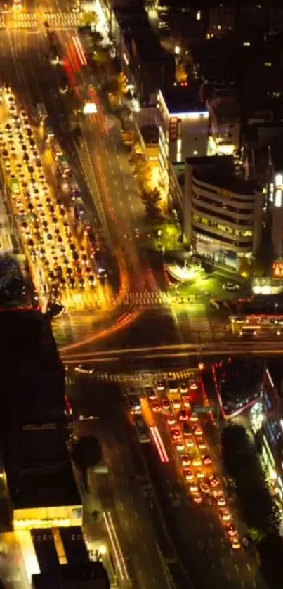 A vibrant city street illuminated by colorful night lights.